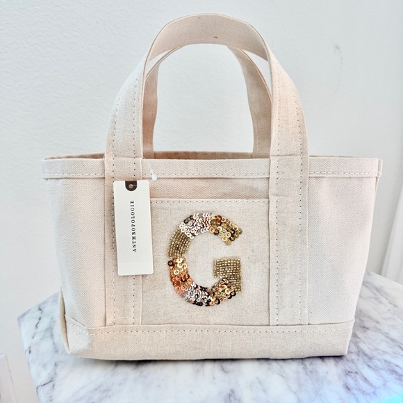 Anthropologie Handbags - 💛 Anthropologie Letter G The Hartley Monogram Mini Canvas Tote Gold Beaded Beige